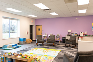 Light purple nursery room at a church.