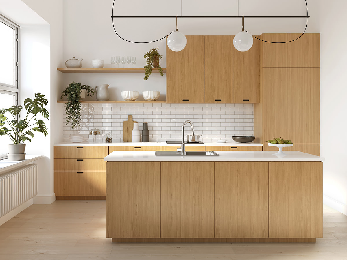 PMV - Blog - Wood Cabinets Are Back 1 Kitchen with light cabinets and an island in the middle.