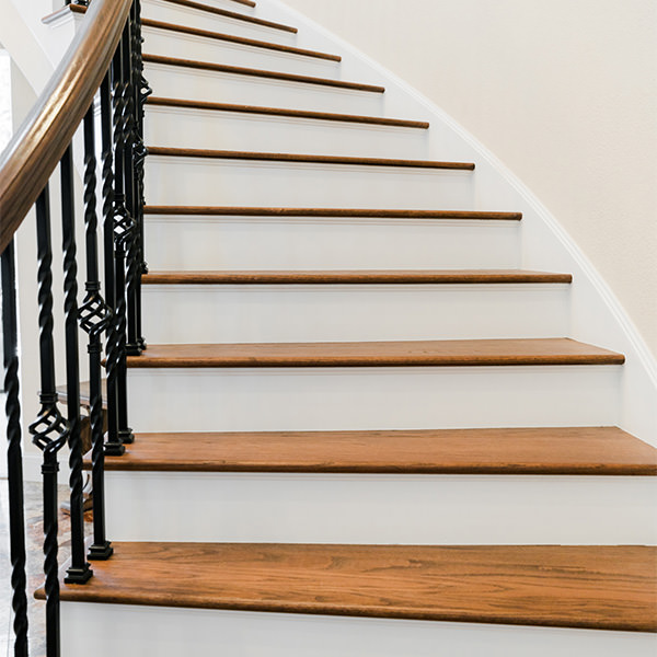 PMV - Project Highlight - Lake Templene Entry 2 Freshly painted and stained stairs with wood treads and white risers.