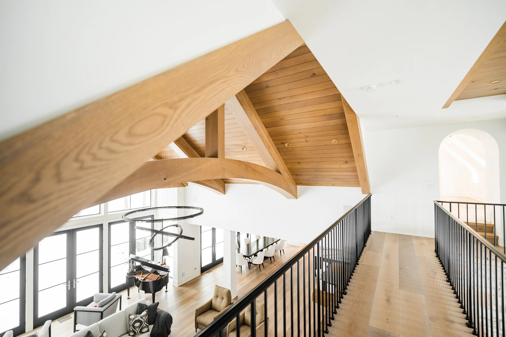 Upper level walkway and railing showing clean lines and consistent interior paint finish