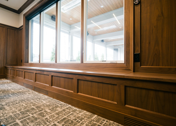 Detailed commercial interior woodwork and custom painted finishes completed by Richland house painters PMV Painting in Michigan