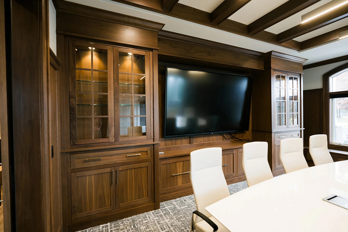 Professional conference room with painted walls and detailed custom woodwork
